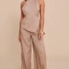 Prettylittlething Stone Textured Woven Halter Neck Jumpsuit -Pretty Little Thing Shop aba79499d7c6c48d7cce521b0fc72542c373352a CNN3665 1 stone textured woven halter neck jumpsuit