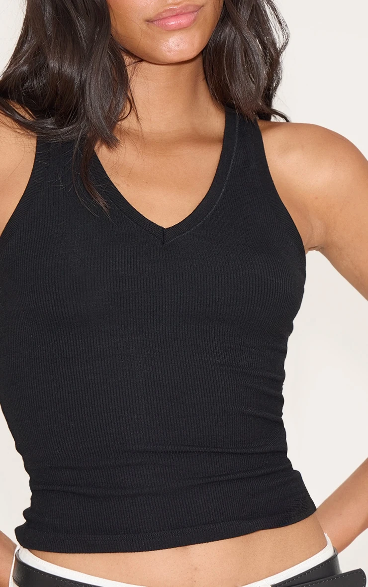 Prettylittlething Black Soft Rib V Neck Vest Top 4 Prettylittlething Black Soft Rib V Neck Vest Top - Image 4
