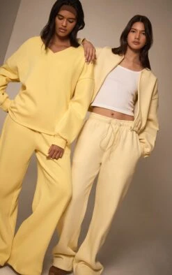 Prettylittlething Butter Yellow Wide Leg Pleated Detail Sweatpants -Pretty Little Thing Shop afd64bf1436dd456eedf0e393302172e4ba82688 CNM6508 4 butter yellow wide leg pleated detail joggers