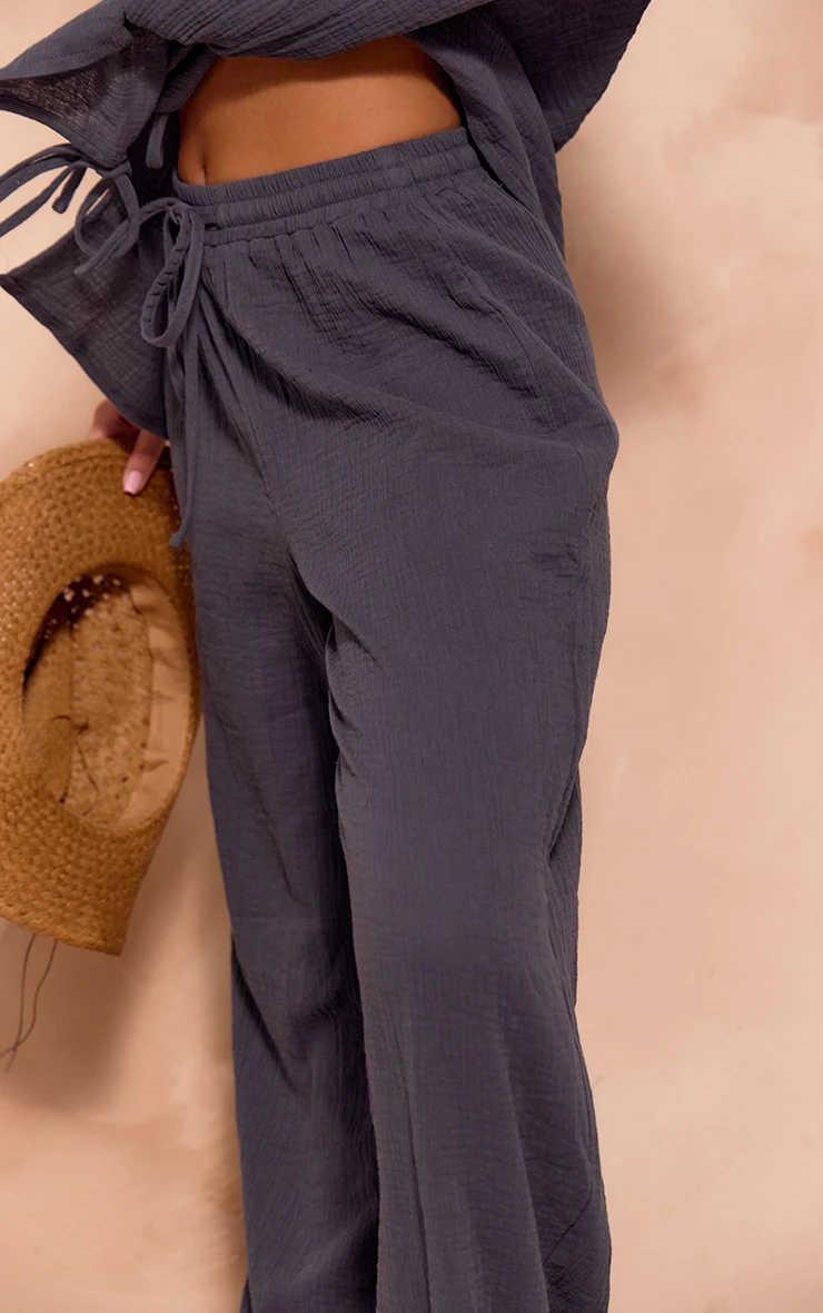 Prettylittlething Dark Blue Textured Cheesecloth Wide Leg Pants 4 Prettylittlething Dark Blue Textured Cheesecloth Wide Leg Pants - Image 4
