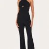 Prettylittlething Black Cross Neck Tie Back Rib Jumpsuit -Pretty Little Thing Shop b93b303dd5bf651600c13f5aa5e4948c53f4d9e0 CMT3909 1 black cross neck tie back rib jumpsuit