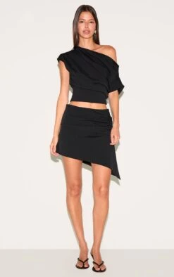Prettylittlething Black Woven Ruched Mid Rise Mini Skirt -Pretty Little Thing Shop b9a335b5e6d773a30f533d01dc5d8500e65d8ba0 CNM8866 4 black woven ruched mid rise mini skirt