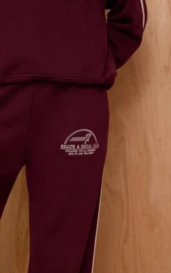 Prettylittlething Wine Health Club Print Wide Leg Sweatpants -Pretty Little Thing Shop ba77bc67258a1b003e7b5e858f7f21d07b8c8d9d CNO4648 4 wine health club print wide leg joggers