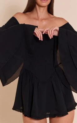 Prettylittlething Black Bardot Flare Sleeve Romper -Pretty Little Thing Shop bbc5170f616db819a2591509b9f5a992e23560eb CNN4946 4 black bardot flare sleeve playsuit