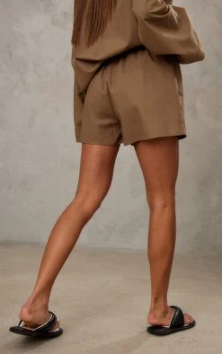 Prettylittlething Khaki Woven Elastic Waist Floaty Shorts 8 Prettylittlething Khaki Woven Elastic Waist Floaty Shorts -Pretty Little Thing Shop c3663310eda3dafe14aa9de0a6bc77610761cf32 cne0234 3