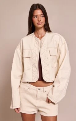 Prettylittlething Ecru Curved Hem Cropped Denim Jacket