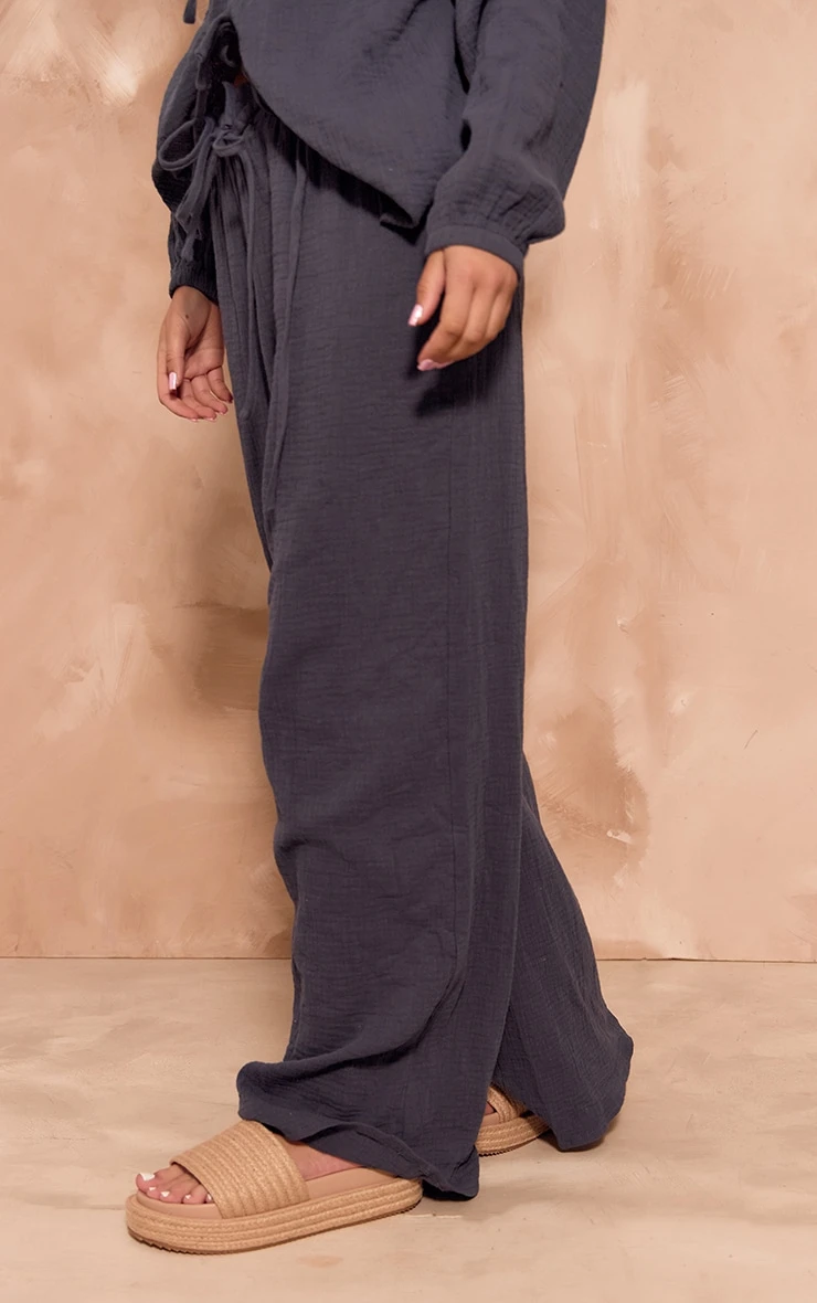 Prettylittlething Dark Blue Textured Cheesecloth Wide Leg Pants 2 Prettylittlething Dark Blue Textured Cheesecloth Wide Leg Pants - Image 2