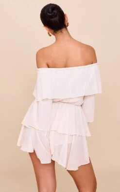 Prettylittlething Cream Chiffon Ruffle Detail Long Sleeve Romper -Pretty Little Thing Shop cae40097390216191a76a8018ee8fda598cd23f9 CNN0128 2 cream chiffon ruffle detail long sleeve playsuit