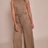 Taupe Woven Button Tie Belt Wide Leg Jumpsuit 10 Taupe Woven Button Tie Belt Wide Leg Jumpsuit -Pretty Little Thing Shop ce36c4921bc45a8364eaf435730b5d66d209d28d CNO0492 1 taupe woven button tie belt wide leg jumpsuit