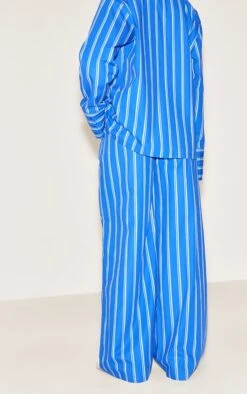 Prettylittlething Blue Striped Cotton Poplin Wide Leg Pants -Pretty Little Thing Shop ce66d51d392589885362ee5c904b6e36f976229c CNN1583 3 blue striped cotton poplin wide leg trousers
