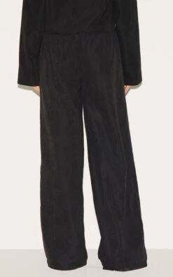 Prettylittlething Black Peach Skin Woven Wide Leg Pants -Pretty Little Thing Shop d01ea2e1220347a392df496de2a92fa8ae7f68f7 CNM0139 3 black peach skin woven wide leg trousers