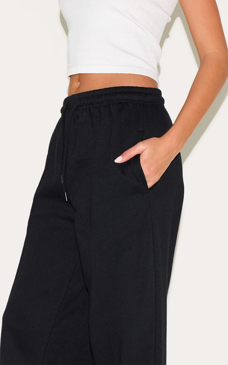 Prettylittlething Black Wide Leg Seam Detail Sweatpants 4 Prettylittlething Black Wide Leg Seam Detail Sweatpants - Image 4