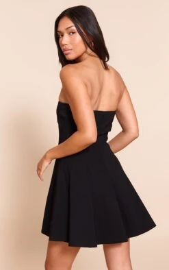 Prettylittlething Black Stretch Woven Bandeau Pleated Shift Dress -Pretty Little Thing Shop dacb2f090c887cc024e6213188906b4a95134b82 CNN4654 2 black stretch woven bandeau pleated shift dress