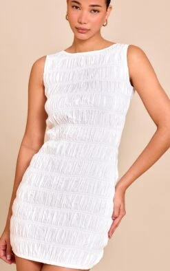 Prettylittlething White Boat Neck Shirred Bodycon Dress -Pretty Little Thing Shop dc7168a6692325d77920e139be7ede3225070008 CNM3573 4 white boat neck shirred bodycon dress