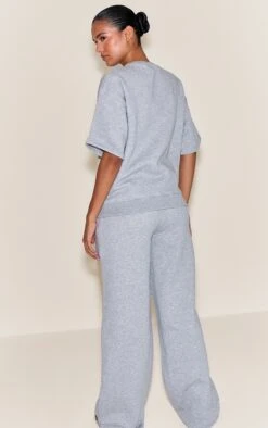 Grey Marl Button Up Wide Leg Sweatpants -Pretty Little Thing Shop e7804c0807e86f0a063f46282878bbbcea37708b CNO1293 3 grey marl button up wide leg joggers
