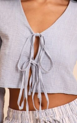 Prettylittlething Light Blue Textured Tie Front Detail Blouse -Pretty Little Thing Shop e86b7a6b0ea6597445586301b06f77381982cbea CNN6740 4 light blue textured tie front detail blouse