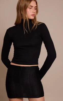 Prettylittlething Black Textured Jersey Mini Skirt