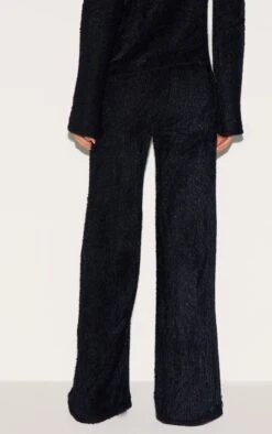 Prettylittlething Black Textured Wide Leg Low Rise Pants -Pretty Little Thing Shop e8fc780ed76874c6f2a02324c04fe354eeead044 CNM2120 3 black textured wide leg low rise trousers