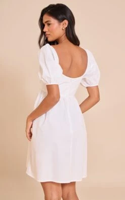 Prettylittlething White Cotton Button Down Smock Dress -Pretty Little Thing Shop e9410392645e82282f07e98ddd1aefbf999b4b25 CNH8071 2 white cotton button down smock dress