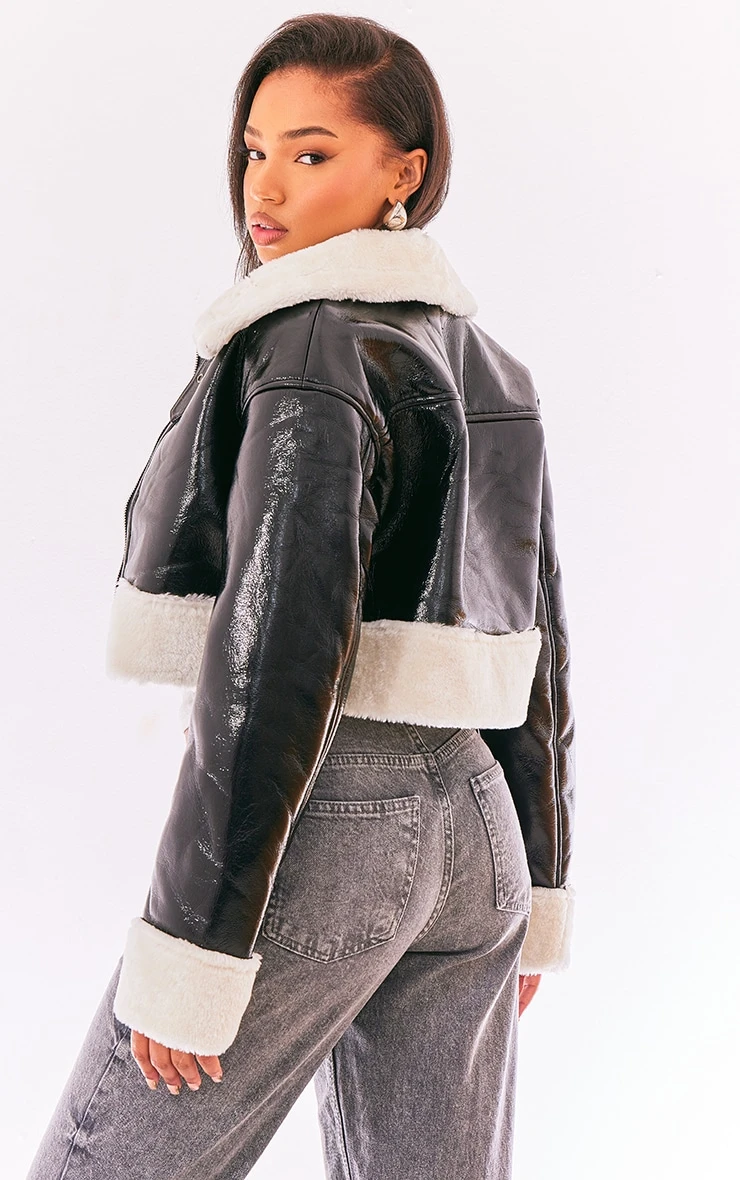 Prettylittlething Black Faux Fur Trim Buckle Collar Vinyl Cropped Jacket 2 Prettylittlething Black Faux Fur Trim Buckle Collar Vinyl Cropped Jacket - Image 2