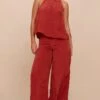 Prettylittlething Rust Crinkle Satin Halterneck Overlay Jumpsuit -Pretty Little Thing Shop f0a97f88a3a8edd9bdf2804e49c40a2264aad84d CNM7303 1 rust crinkle satin halterneck overlay jumpsuit