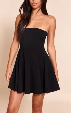 Prettylittlething Black Stretch Woven Bandeau Pleated Shift Dress -Pretty Little Thing Shop f3543c1734222332335ecc94e33e9bde61337851 CNN4654 4 black stretch woven bandeau pleated shift dress