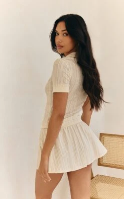 Prettylittlething Cream Textured Button Detail Mini Skort -Pretty Little Thing Shop f3767da714e5a71c60a19f5dad6e003be65f48b4 CNM6173 2 cream textured button detail mini skort