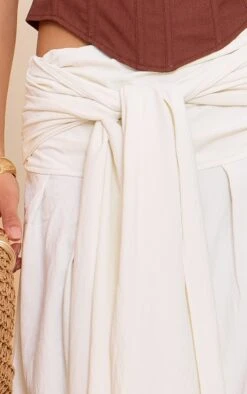 Prettylittlething Cream Floaty Woven Knot Front Maxi Skirt -Pretty Little Thing Shop f6480fa6522317b360c443df67959b96e7ab6ec0 CNN0503 4 cream floaty woven knot front maxi skirt