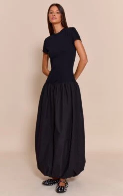 Black Dropped Waist T Shirt Puff Ball Hem Maxi Dress 7 Black Dropped Waist T Shirt Puff Ball Hem Maxi Dress -Pretty Little Thing Shop f88f4fa09573c0c0e3c80357810f287e98eaf928 CNO2453 3 black sleeveless straight neck shift dress