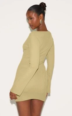 Prettylittlething Olive Onion Skin Boat Neck Flute Sleeve Mini Dress -Pretty Little Thing Shop fd484b64e0a69daab6bfe7046902108d9219cf4b CNN2959 2 olive onion skin boat neck flute sleeve mini dress