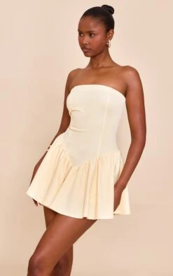 Prettylittlething Butter Yellow Woven Bandeau Dropped Waist Romper -Pretty Little Thing Shop fe4a8eeaaa57804d724767b90515fcd72d0d6cd3 CNM7307 4 butter yellow woven bandeau dropped waist playsuit